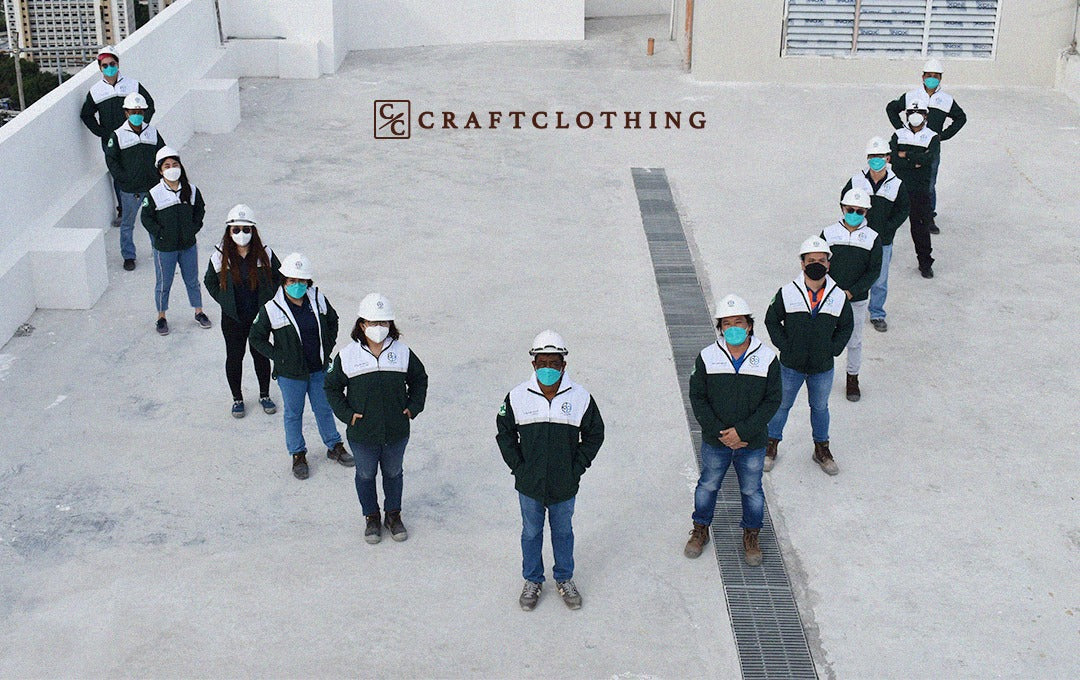 Team Dreambuilders Pro, Inc. is proudly posing with their custom jackets made by Craft Clothing.